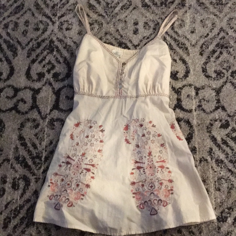 versona cream blouse with red floral design size S